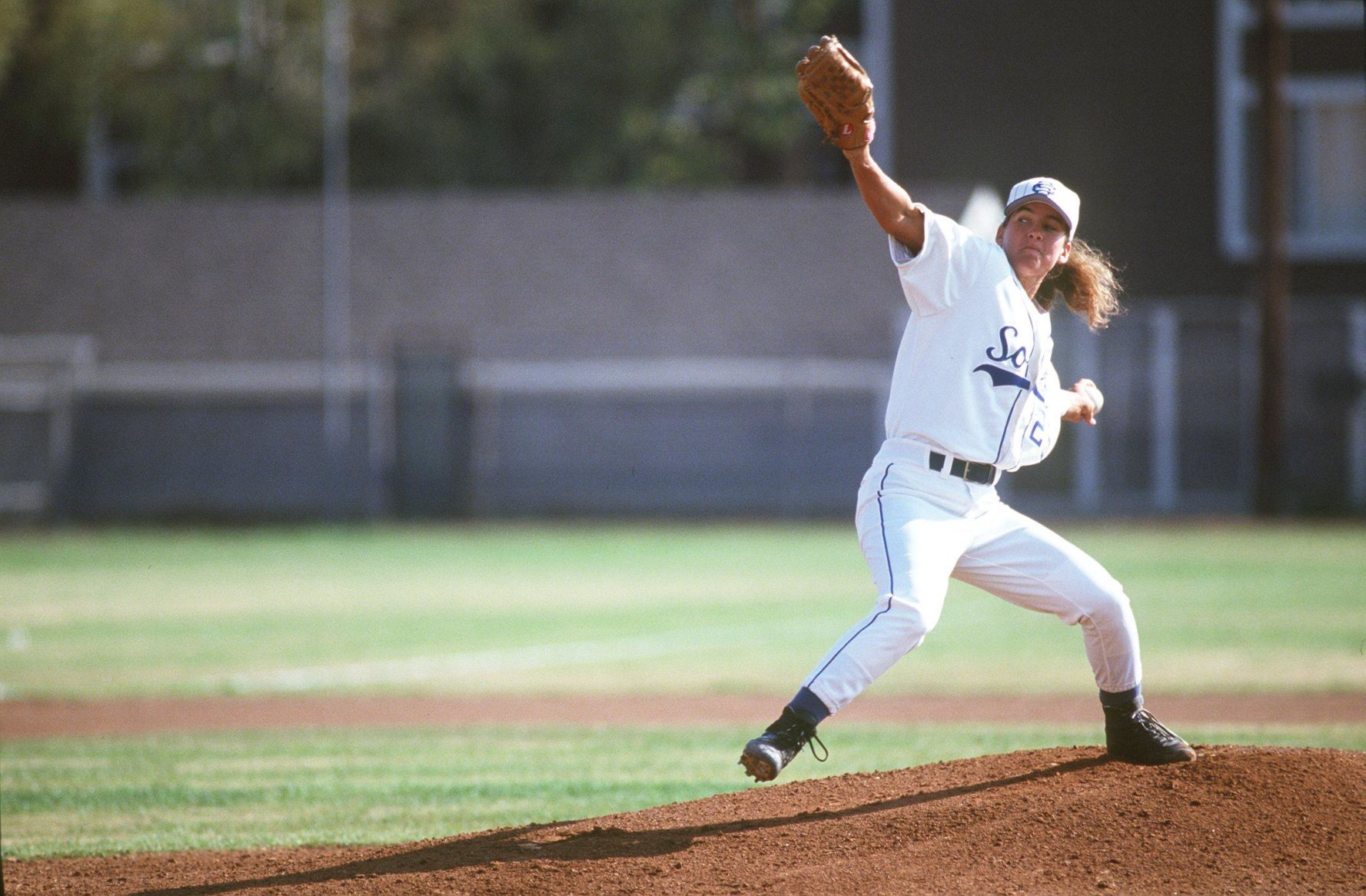 1998: First woman to pitch MLB baseball